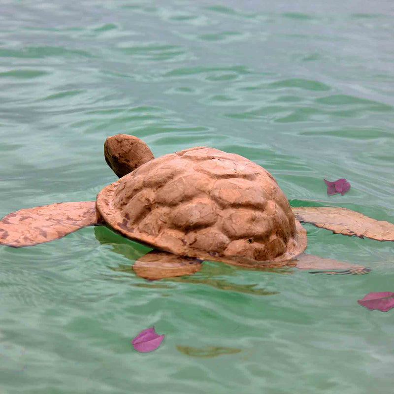 Turtle Biodegradable Water Urn for Ashes in Water with Petals from Behind