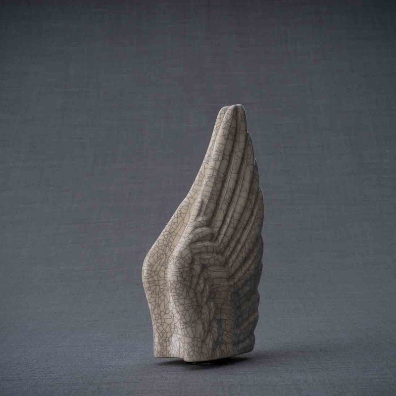 Angel Wings Ashes Keepsake Urn in Crackle Glaze Turned Right Dark Background