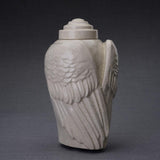 Wings Cremation Urn for Ashes in Crackle Glaze Turned Right Dark Background