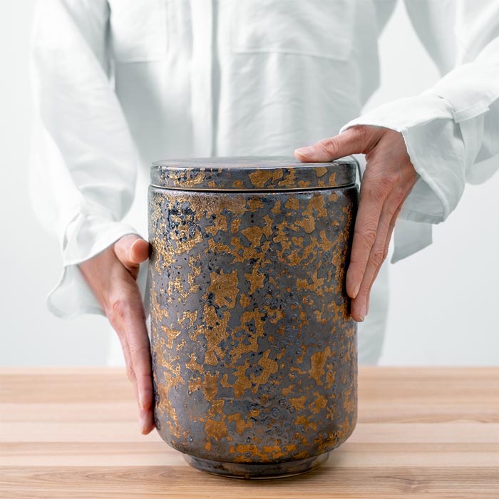 kairos Cremation Urn for Ashes Being Held