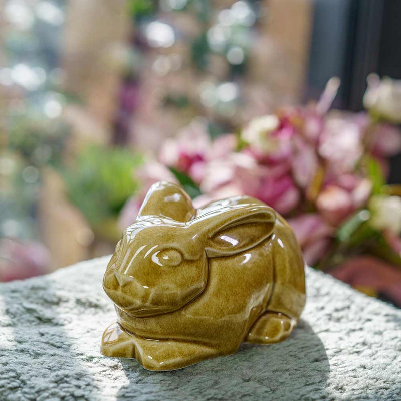 Rabbit Urn For Ashes Amber On Cushion Front Left