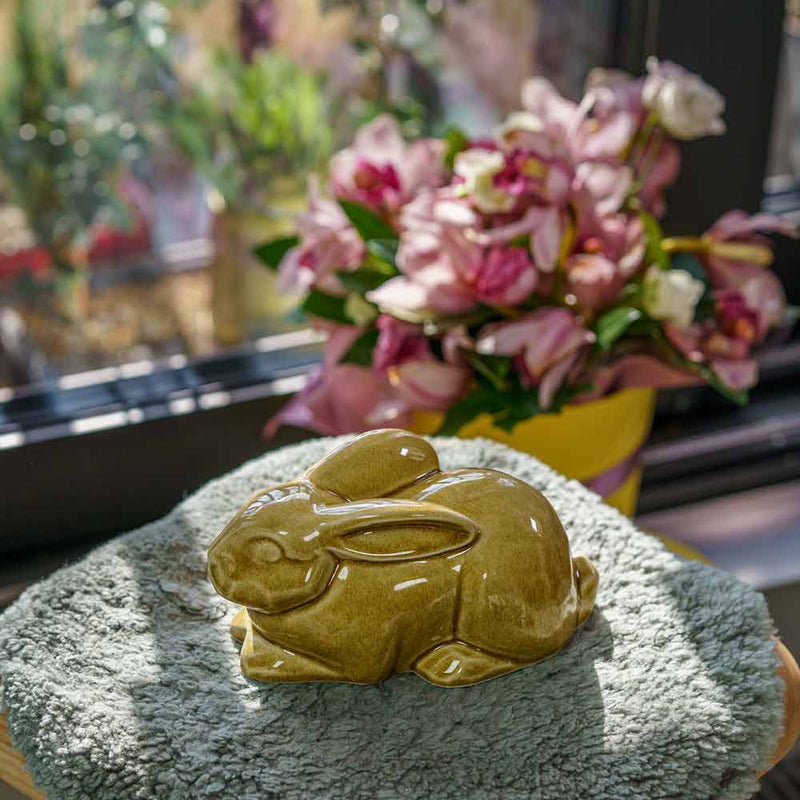 Rabbit Urn For Ashes Amber On Cushion Left