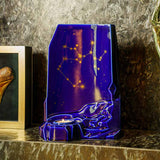zodiac star sign adult cremation urn for ashes range sagittarius on shelf next to photo